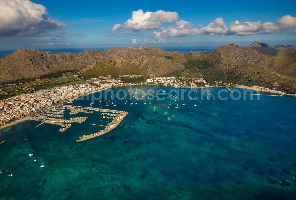 Aerial image Port de Pollenca - Pleasure boat marina with docks and moorings on the shore area in Port de Pollenca in Balearische Insel Mallorca, Spain