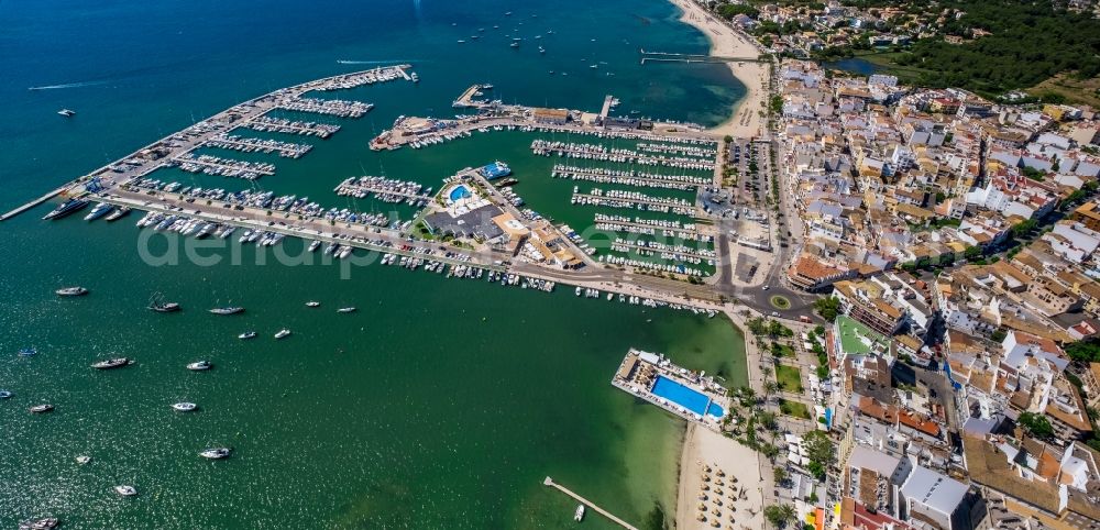 Aerial image Port de Pollenca - Pleasure boat marina with docks and moorings on the shore area in Port de Pollenca in Balearische Insel Mallorca, Spain