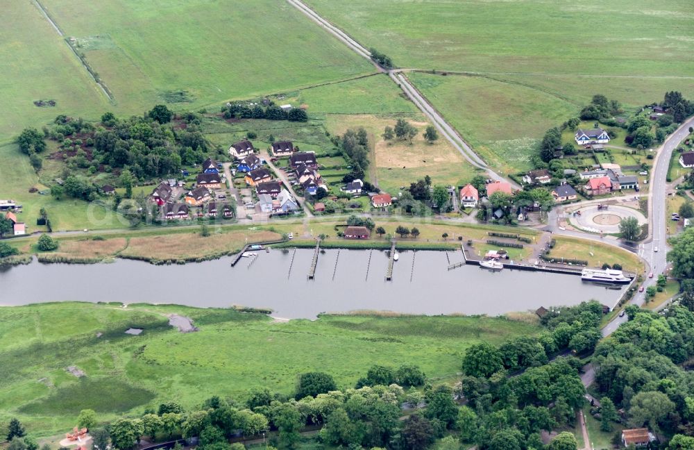 Prerow from the bird's eye view: Pleasure boat marina with docks and moorings on the shore area in Prerow in the state Mecklenburg - Western Pomerania, Germany