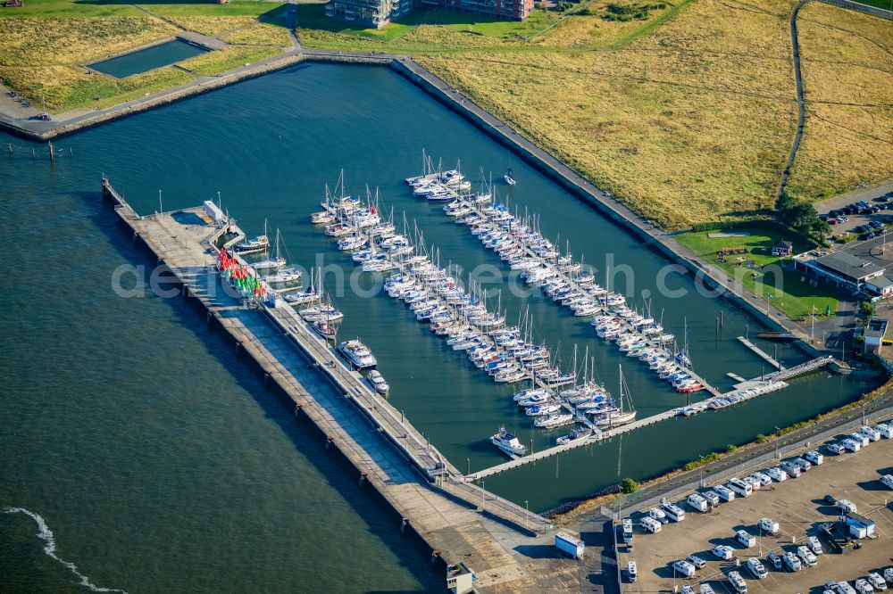 Cuxhaven from above - Pleasure boat marina with docks and moorings on the shore area of Reederei Cassen Eils GmbH Bei der Alten Liebe in Cuxhaven in the state Lower Saxony