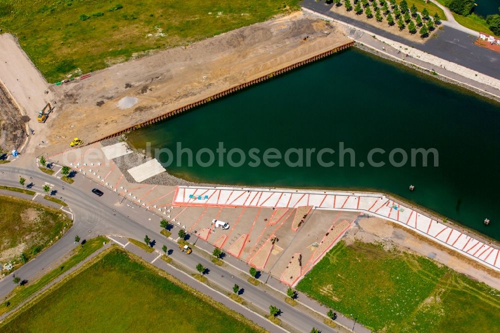 Gelsenkirchen from the bird's eye view: Pleasure boat marina with docks and moorings on the shore area des Rhein-Herne-Kanal on the grounds of the former Graf Bismarck colliery in Gelsenkirchen in the state North Rhine-Westphalia