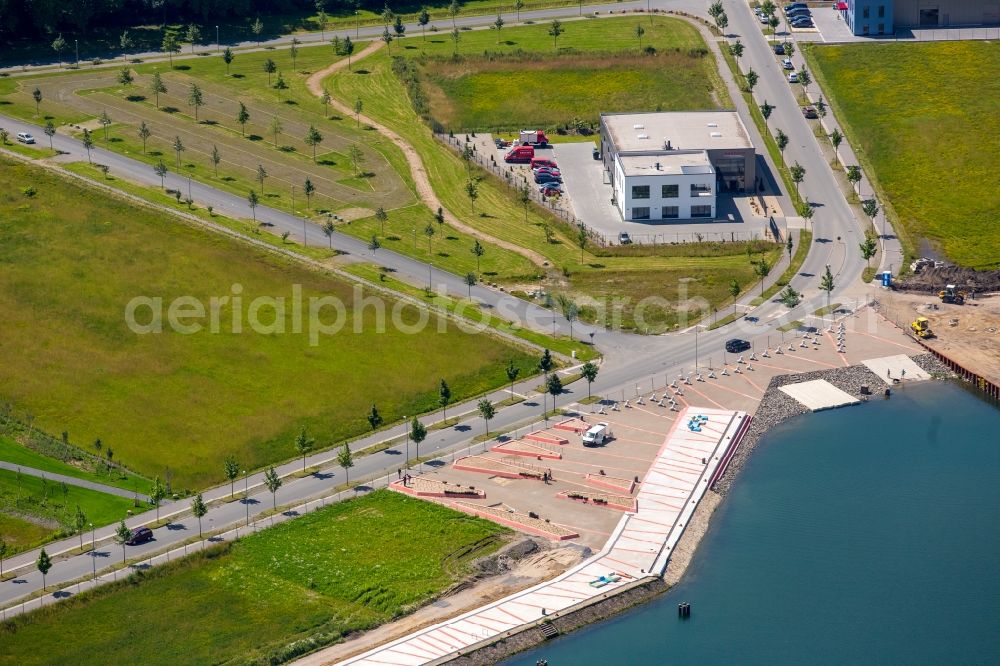 Gelsenkirchen from above - Pleasure boat marina with docks and moorings on the shore area des Rhein-Herne-Kanal on the grounds of the former Graf Bismarck colliery in Gelsenkirchen in the state North Rhine-Westphalia