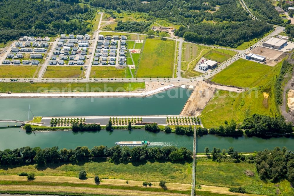 Gelsenkirchen from the bird's eye view: Pleasure boat marina with docks and moorings on the shore area des Rhein-Herne-Kanal on the grounds of the former Graf Bismarck colliery in Gelsenkirchen in the state North Rhine-Westphalia