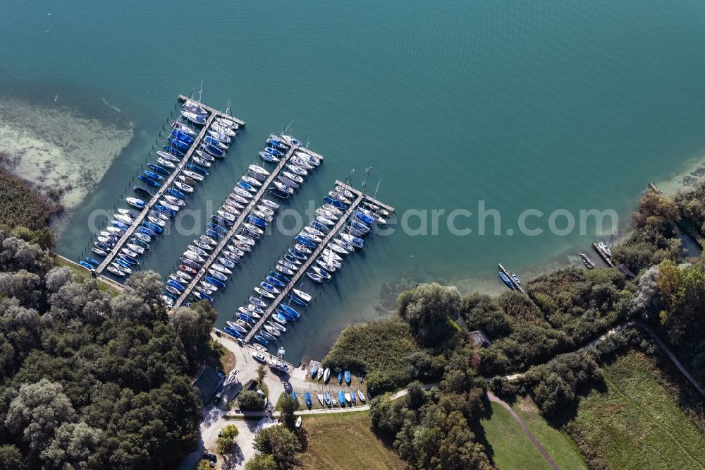 Breitbrunn am Chiemsee from the bird's eye view: Pleasure boat marina with docks and moorings on the shore area Sailing Club Breitbrunn-Chiemsee (SCBC) e.V. in Breitbrunn am Chiemsee in the state Bavaria, Germany