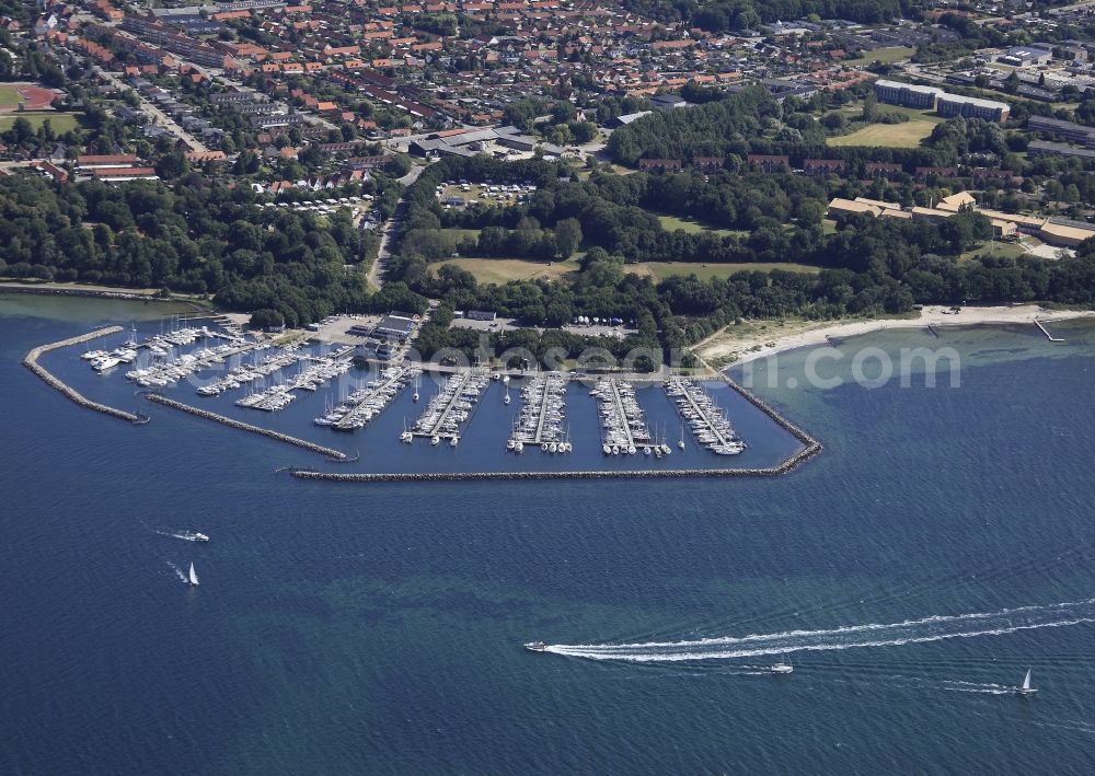 Sonderburg from the bird's eye view: Pleasure boat marina with docks and moorings on the shore area in Sonderborg in Denmark