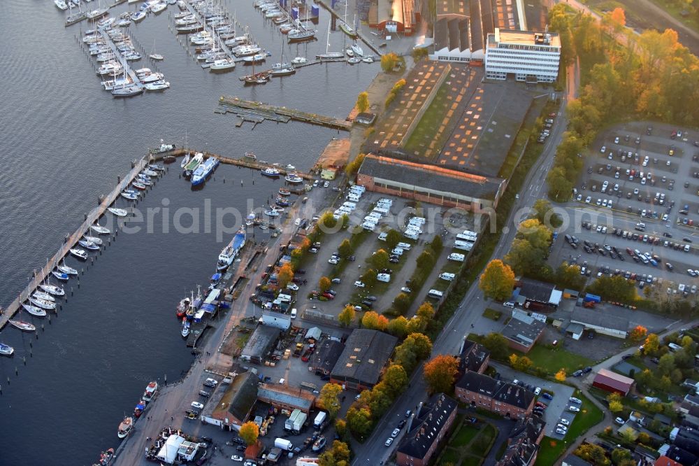 Travemünde from above - Pleasure boat marina with docks and moorings on the shore area of Trave in Travemuende in the state Schleswig-Holstein, Germany