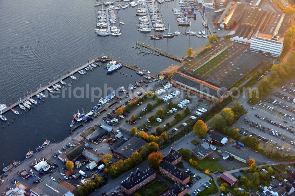 Travemünde from the bird's eye view: Pleasure boat marina with docks and moorings on the shore area of Trave in Travemuende in the state Schleswig-Holstein, Germany