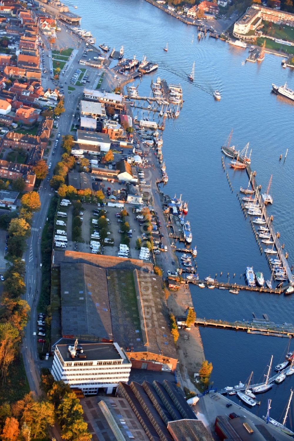 Travemünde from above - Pleasure boat marina with docks and moorings on the shore area of Trave in Travemuende in the state Schleswig-Holstein, Germany