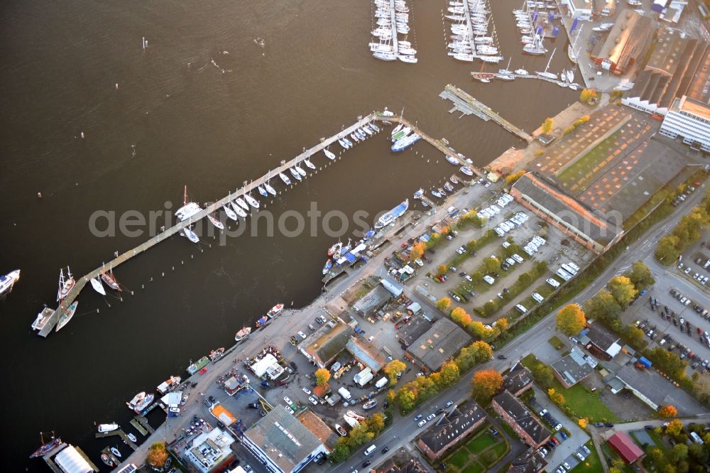 Travemünde from above - Pleasure boat marina with docks and moorings on the shore area of Trave in Travemuende in the state Schleswig-Holstein, Germany