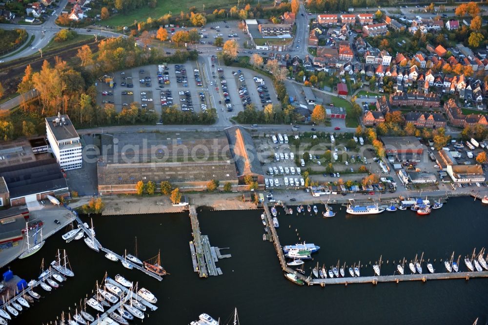 Travemünde from above - Pleasure boat marina with docks and moorings on the shore area of Trave in Travemuende in the state Schleswig-Holstein, Germany