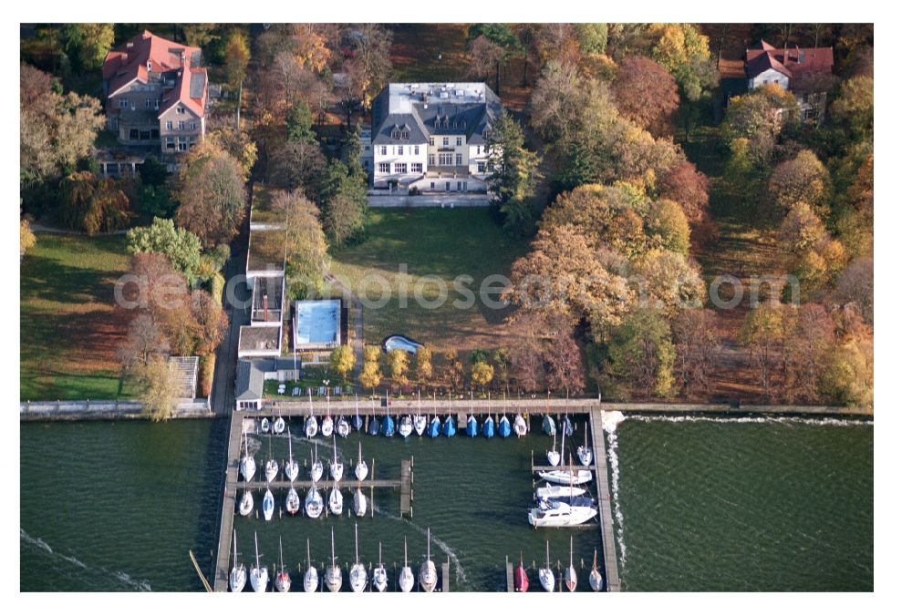 Berlin from above - Pleasure boat marina with docks and moorings on the shore area of Wannsee in the district Wannsee in Berlin, Germany