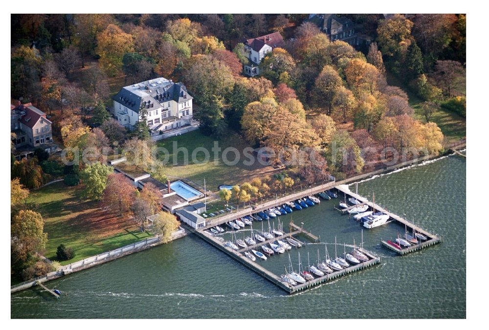 Berlin from above - Pleasure boat marina with docks and moorings on the shore area of Wannsee in the district Wannsee in Berlin, Germany