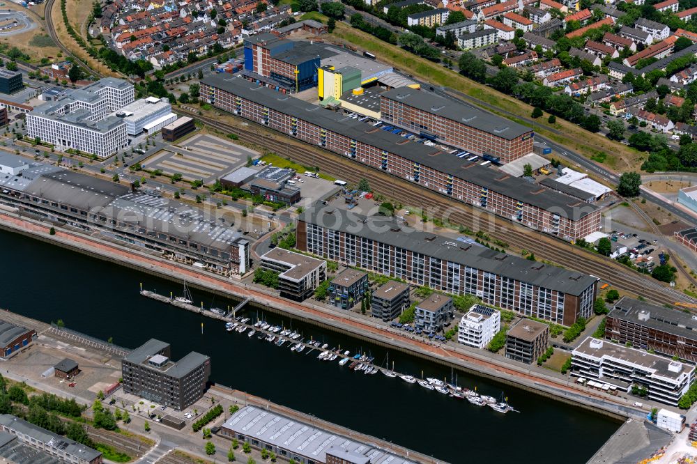 Bremen from above - Pleasure boat marina with docks and moorings on the shore area of the Weser river in Bremen, Germany