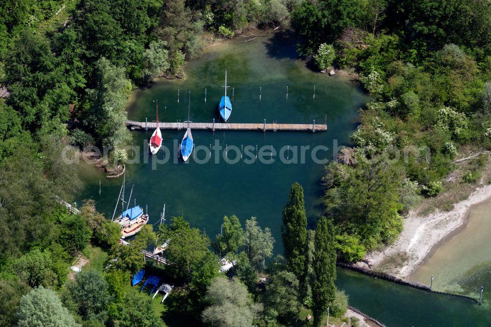 Bodman-Ludwigshafen from above - Pleasure boat marina with docks and moorings on the shore area in Bodman-Ludwigshafen in the state Baden-Wuerttemberg, Germany