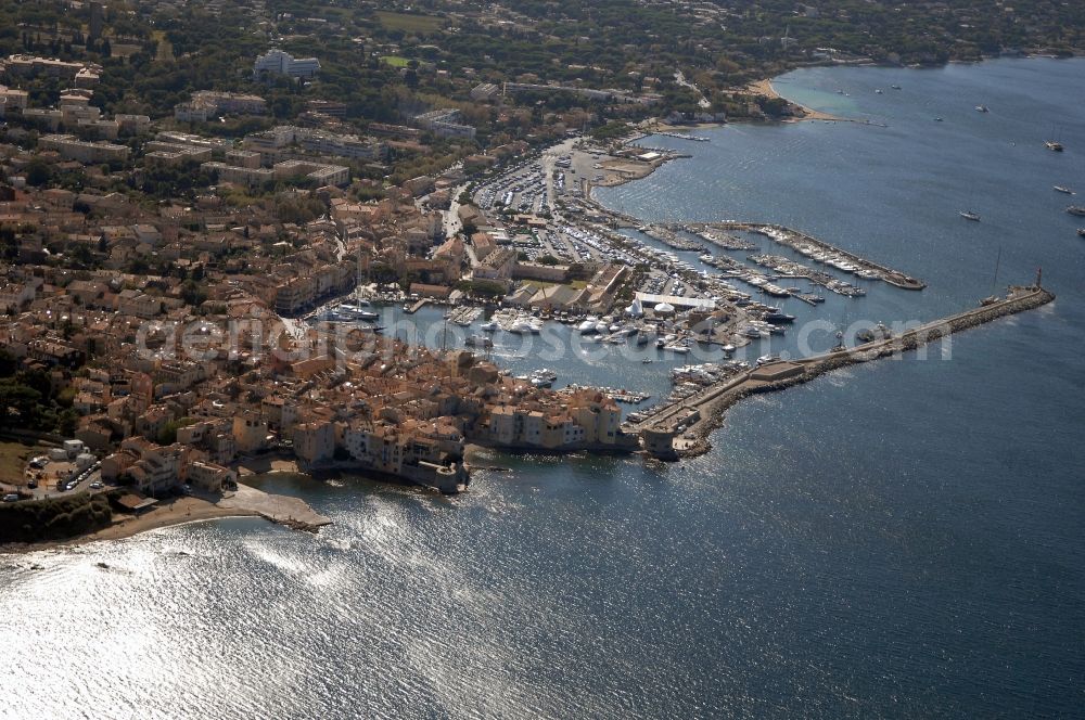 Aerial image Saint-Tropez - Pleasure boat marina with docks and moorings on the shore area Golfe de Saint-Tropez in Saint-Tropez in Provence-Alpes-Cote d'Azur, France