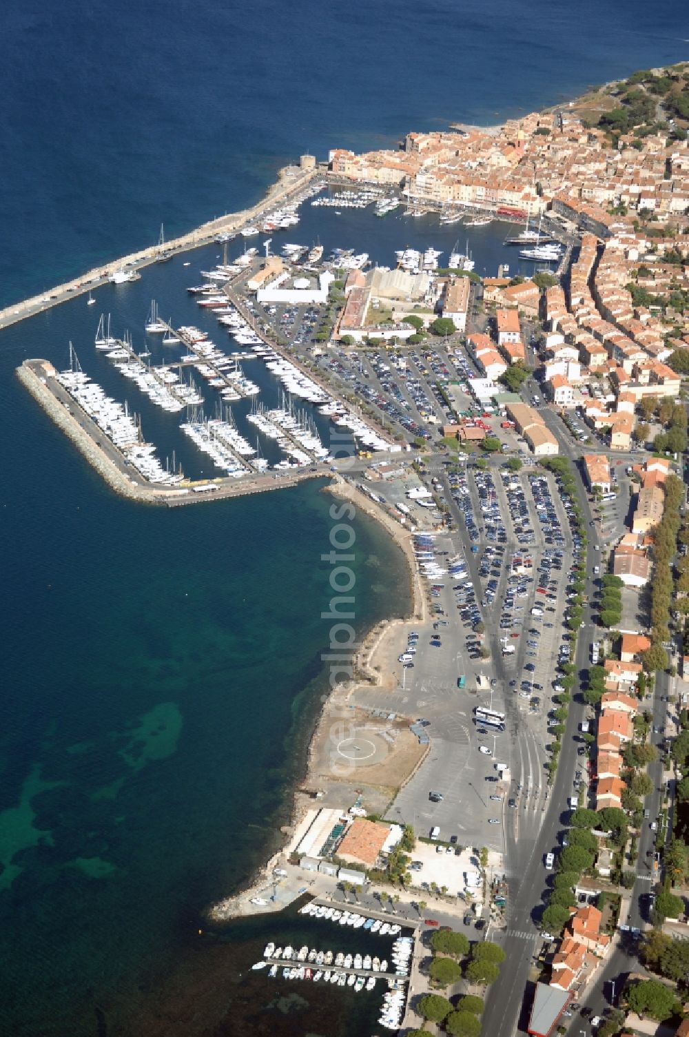 Aerial image Saint-Tropez - Pleasure boat marina with docks and moorings on the shore area Golfe de Saint-Tropez in Saint-Tropez in Provence-Alpes-Cote d'Azur, France