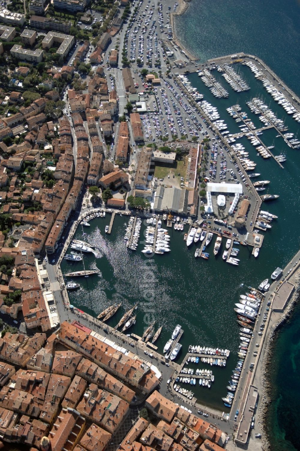 Aerial image Saint-Tropez - Pleasure boat marina with docks and moorings on the shore area Golfe de Saint-Tropez in Saint-Tropez in Provence-Alpes-Cote d'Azur, France