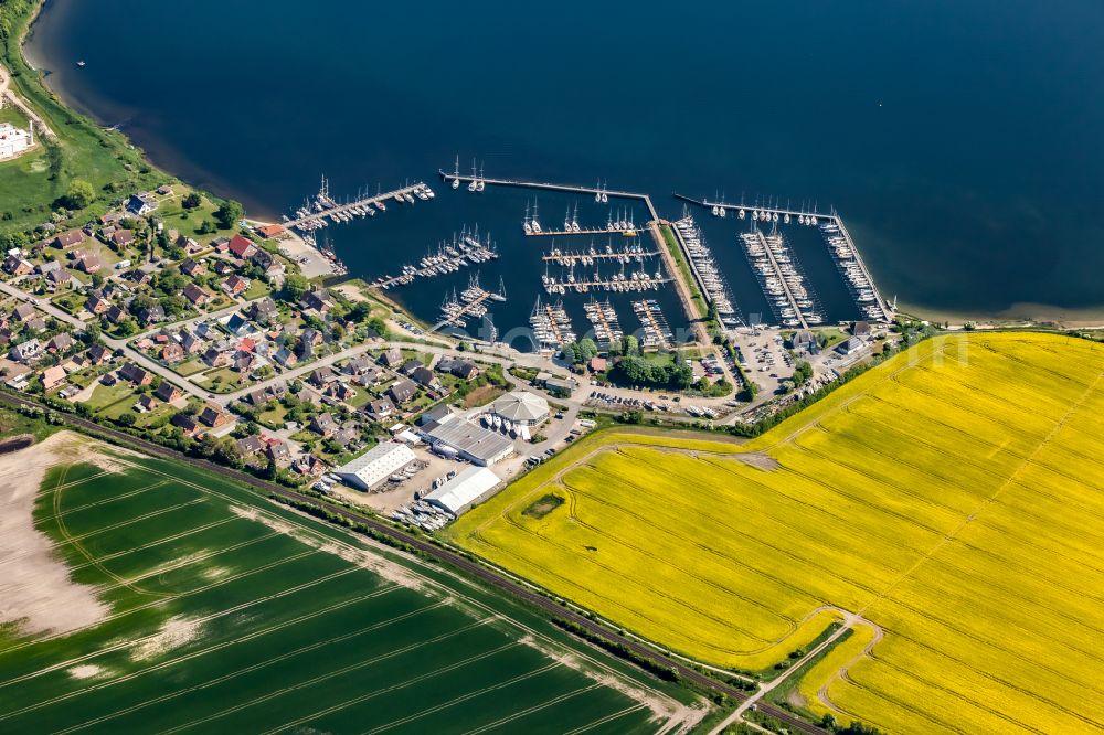 Großenbrode from above - Pleasure boat marina with docks and moorings on the shore area of Grossenbroder Binnensee in Grossenbrode in the state Schleswig-Holstein, Germany