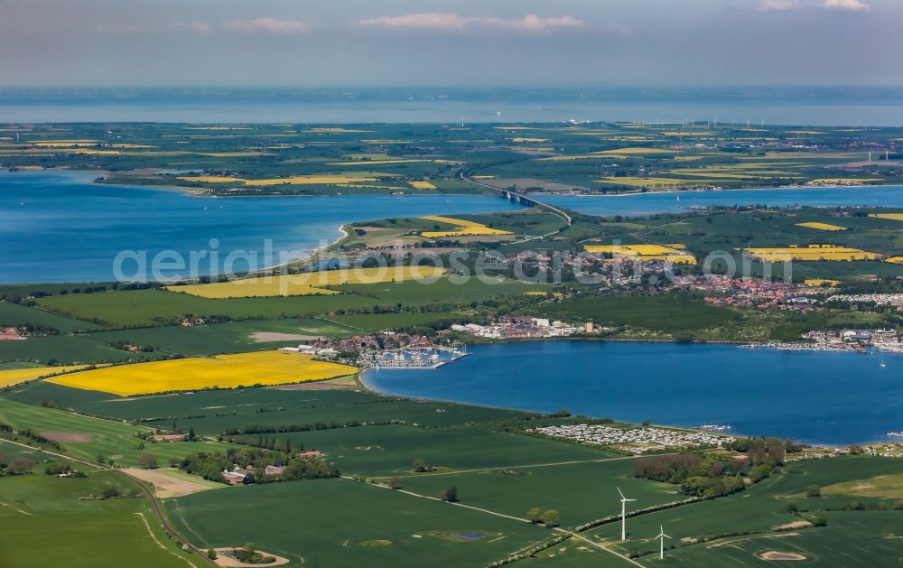 Großenbrode from above - Pleasure boat marina with docks and moorings on the shore area Grossenbroder Binnensee in Grossenbrode in the state Schleswig-Holstein, Germany