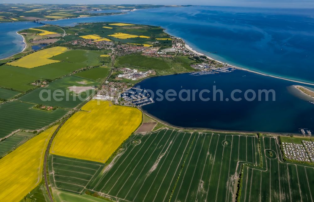 Großenbrode from the bird's eye view: Pleasure boat marina with docks and moorings on the shore area Grossenbroder Binnensee in Grossenbrode in the state Schleswig-Holstein, Germany