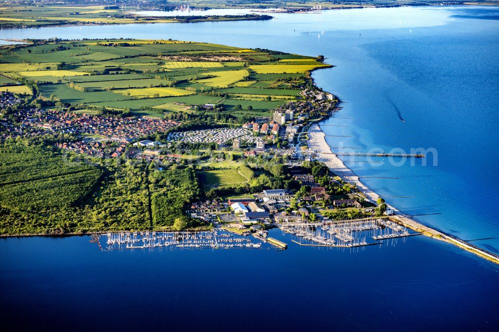 Großenbrode from the bird's eye view: Pleasure boat marina with docks and moorings on the shore area Grossenbroder Binnensee in Grossenbrode in the state Schleswig-Holstein, Germany