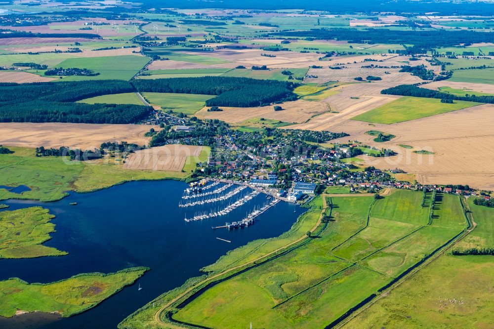 Kröslin from above - Pleasure boat marina with docks and moorings on the shore area of BALTIC SEA RESORT of Kroessliner See on street Hafenstrasse in Kroeslin in the state Mecklenburg - Western Pomerania, Germany