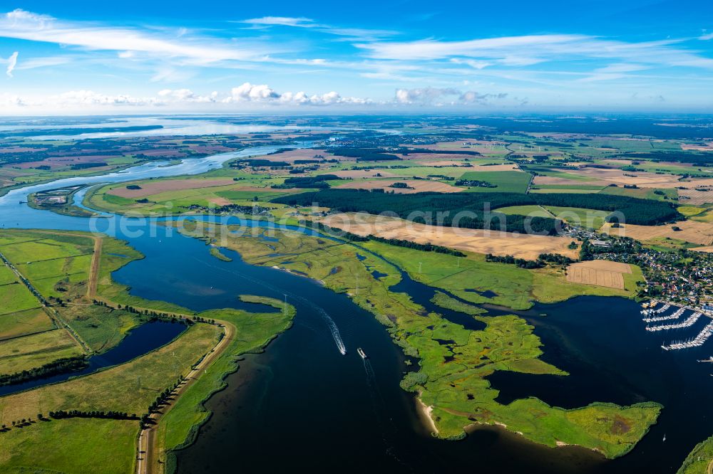 Aerial image Kröslin - Pleasure boat marina with docks and moorings on the shore area of BALTIC SEA RESORT of Kroessliner See on street Hafenstrasse in Kroeslin in the state Mecklenburg - Western Pomerania, Germany