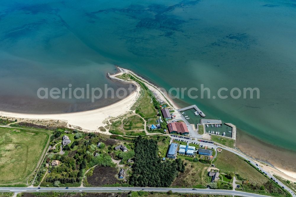 Munkmarsch from the bird's eye view: Pleasure boat marina with docks and moorings on the shore area northern sea in Munkmarsch at the island Sylt in the state Schleswig-Holstein, Germany