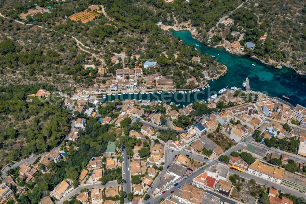 Aerial photograph Cala Figuera - Pleasure boat marina with docks and moorings on the shore area of the Port de Cala Figuera and Calo d'en Busques in Cala Figuera in Balearic island of Mallorca, Spain