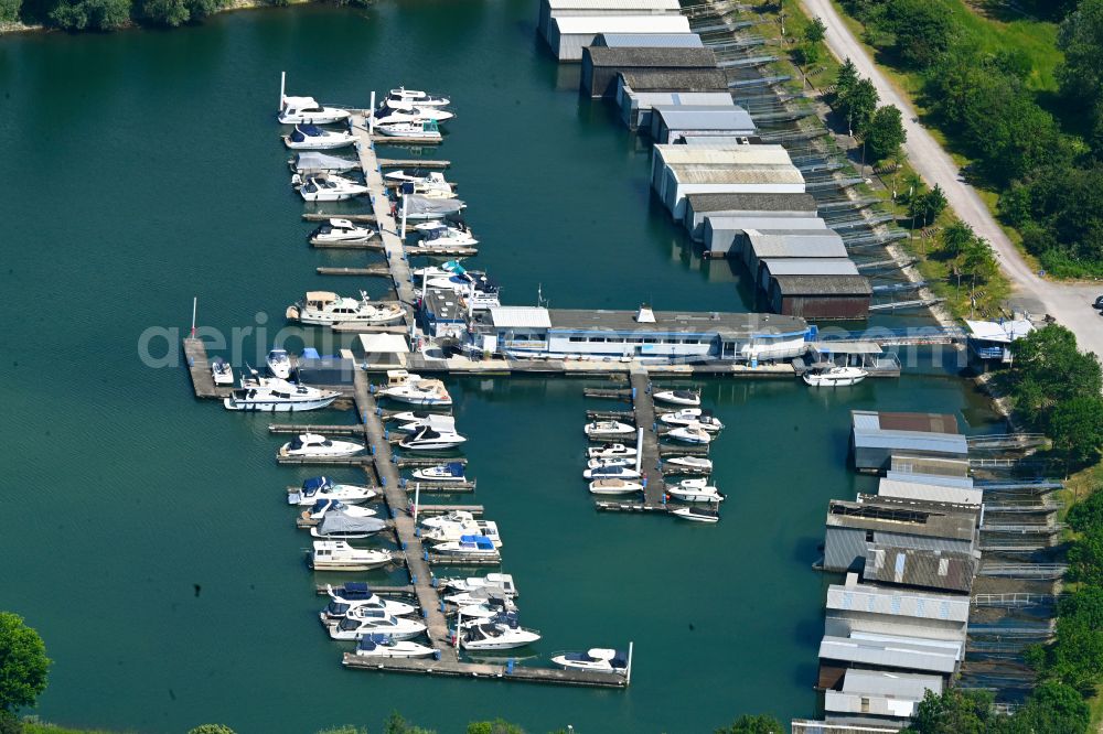 Wörth am Rhein from the bird's eye view: Pleasure boat marina with docks and moorings on the shore area of the Rhine river in Woerth am Rhein in the state Baden-Wuerttemberg, Germany