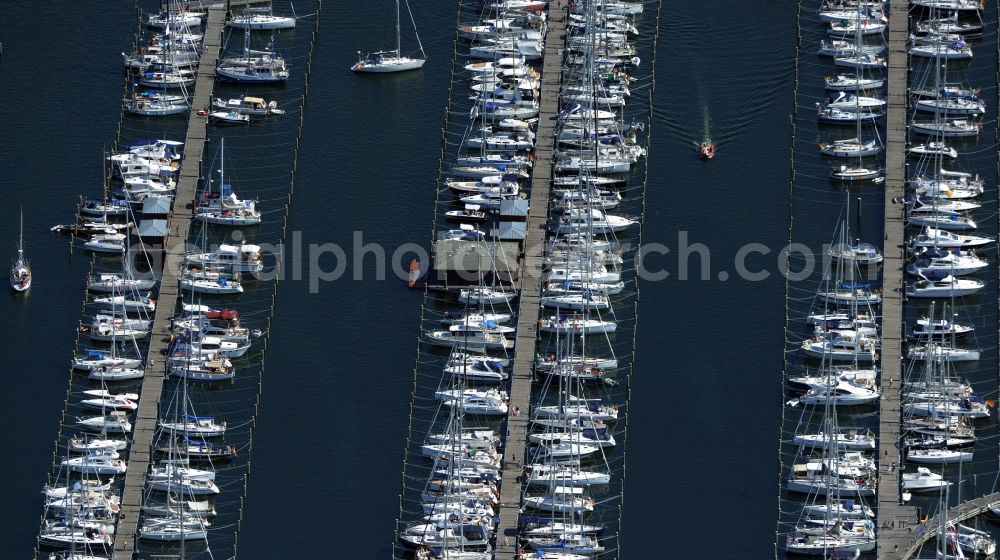 Rostock from the bird's eye view: Pleasure boat marina with docks and moorings on the shore area of baltic see in Rostock in the state Mecklenburg - Western Pomerania