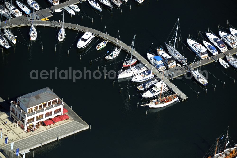 Rostock from the bird's eye view: Pleasure boat marina with docks and moorings on the shore area of baltic see in Rostock in the state Mecklenburg - Western Pomerania