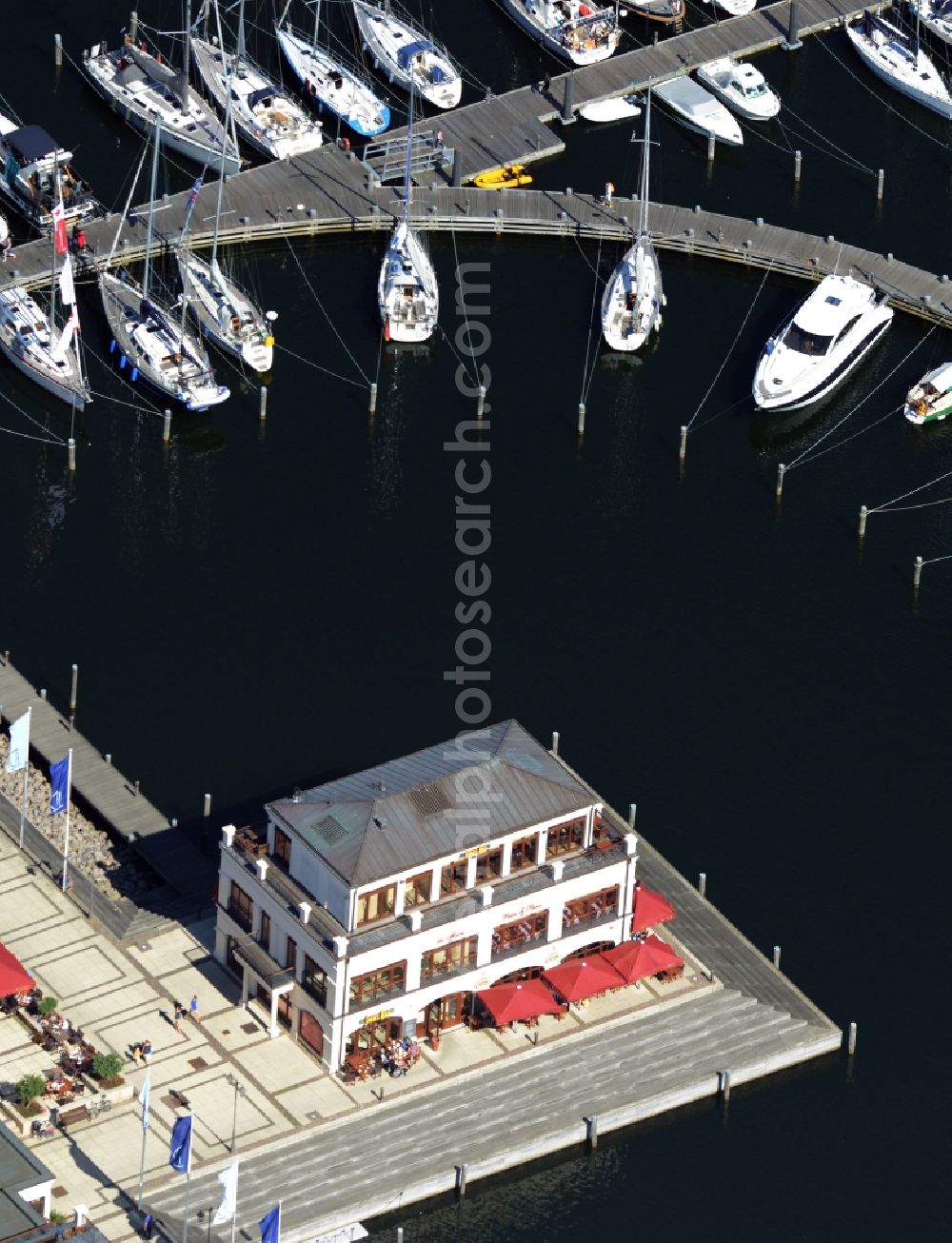 Aerial image Rostock - Pleasure boat marina with docks and moorings on the shore area of baltic see in Rostock in the state Mecklenburg - Western Pomerania