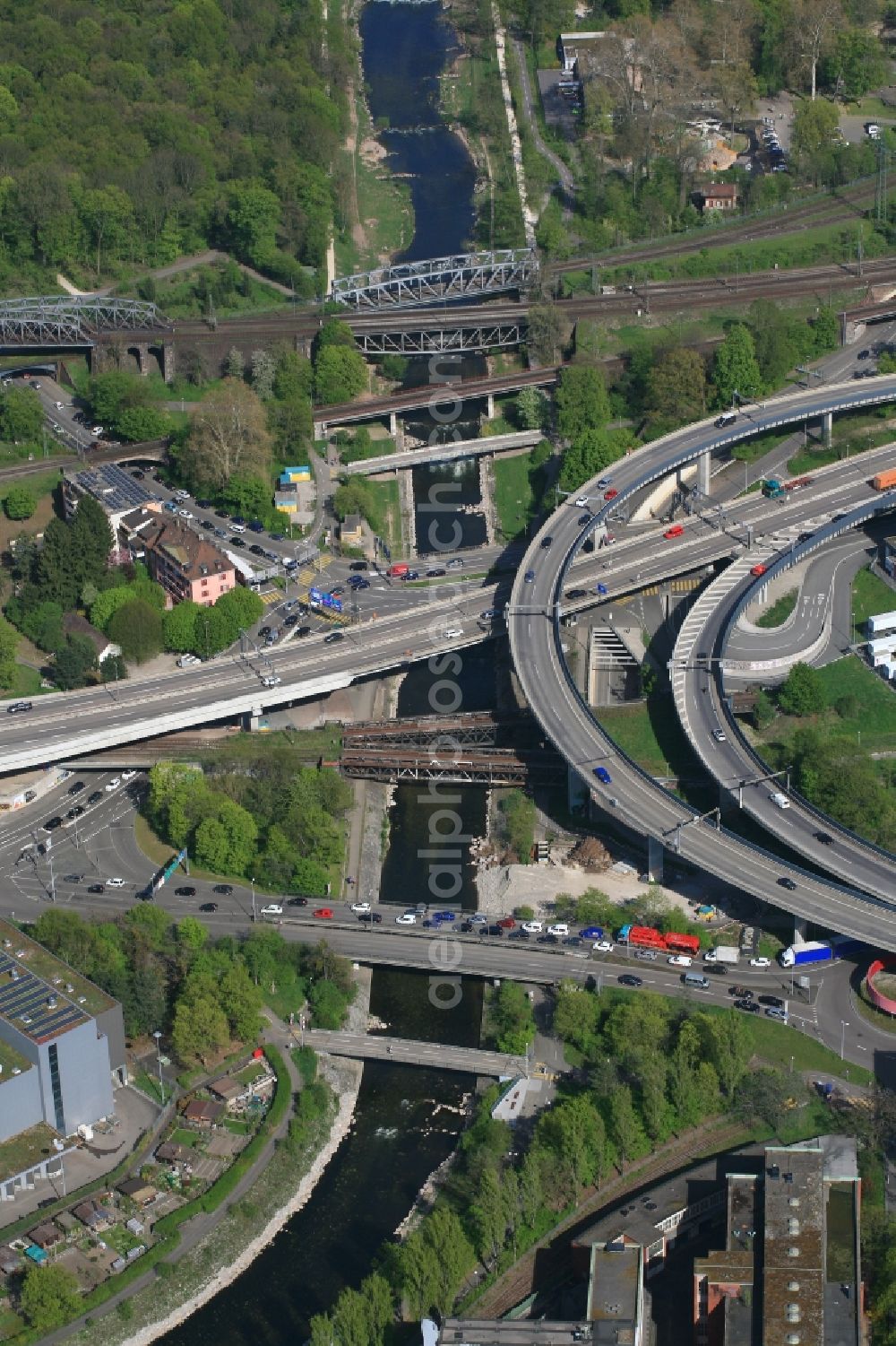 Basel from the bird's eye view: Numerous bridges span the river Wiese in Basel in Switzerland shortly before its confluence with the Rhine