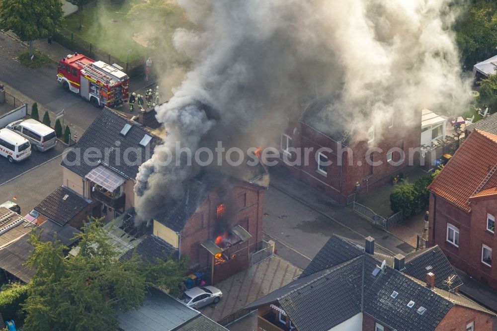 Aerial image Bönen - Large Fire - Brandherd- house fire in the Gustav Street in Boenen in the Ruhr area in North Rhine-Westphalia