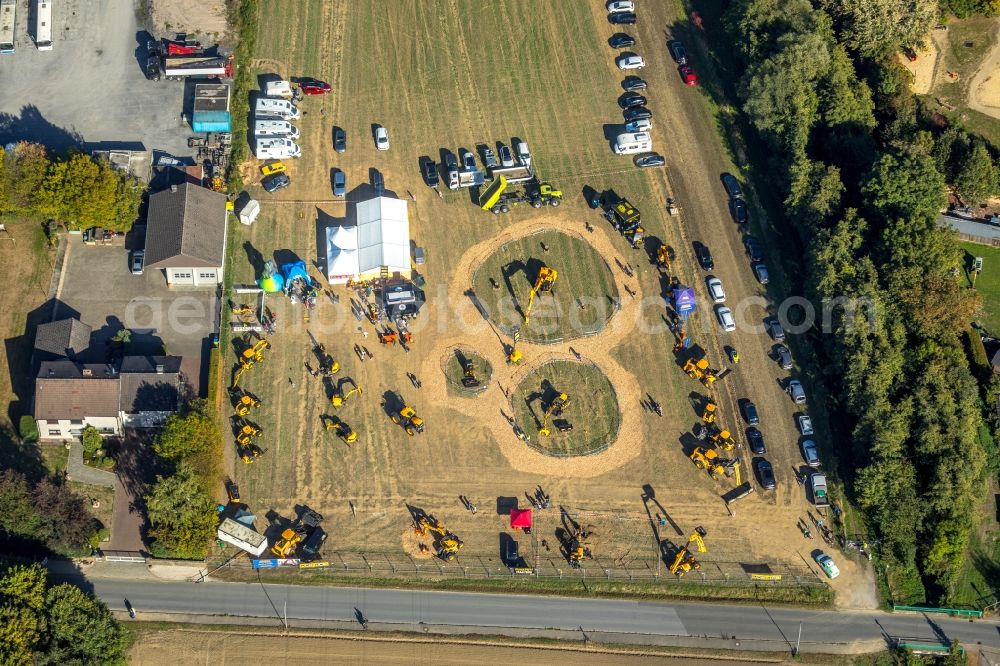 Unna from the bird's eye view: Tent construction and assembly at the venue of Ruhrpott Masters 2018 / Baggerwettbewerb in Unna in the state North Rhine-Westphalia, Germany