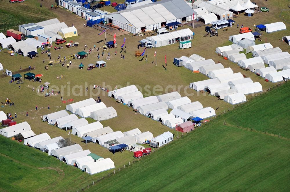 Aerial photograph Garlstorf - View of the youth fire brigade camp in the district of Harburg in Garlstorf in Lower Saxony. The tent camp was attended by 86 youth fire brigades from the district of Harburg