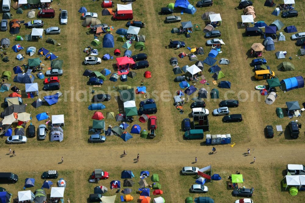 Gräfenhainichen from above - View of campground landscape for visitors to the Melt! Festival in Eisenstadt Ferropolis in Graefenhainichen in the state of Saxony-Anhalt. The Melt is a music festival with electronic music and Rock Sound. Since 1999 the festival at Graefenhainichen takes place in the City of Steel Ferropolis