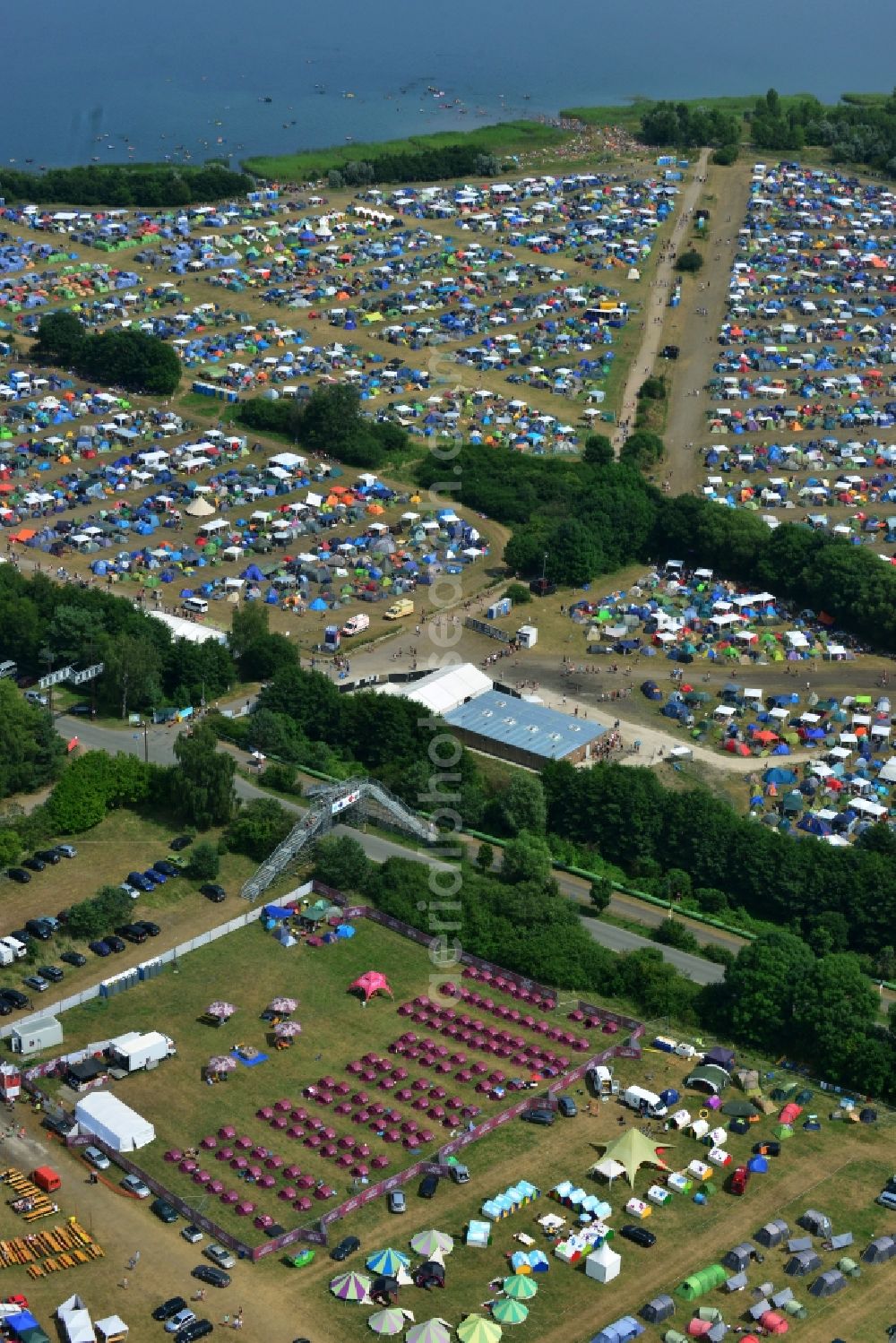 Aerial image Gräfenhainichen - View of campground landscape for visitors to the Melt! Festival in Eisenstadt Ferropolis in Graefenhainichen in the state of Saxony-Anhalt. The Melt is a music festival with electronic music and Rock Sound. Since 1999 the festival at Graefenhainichen takes place in the City of Steel Ferropolis