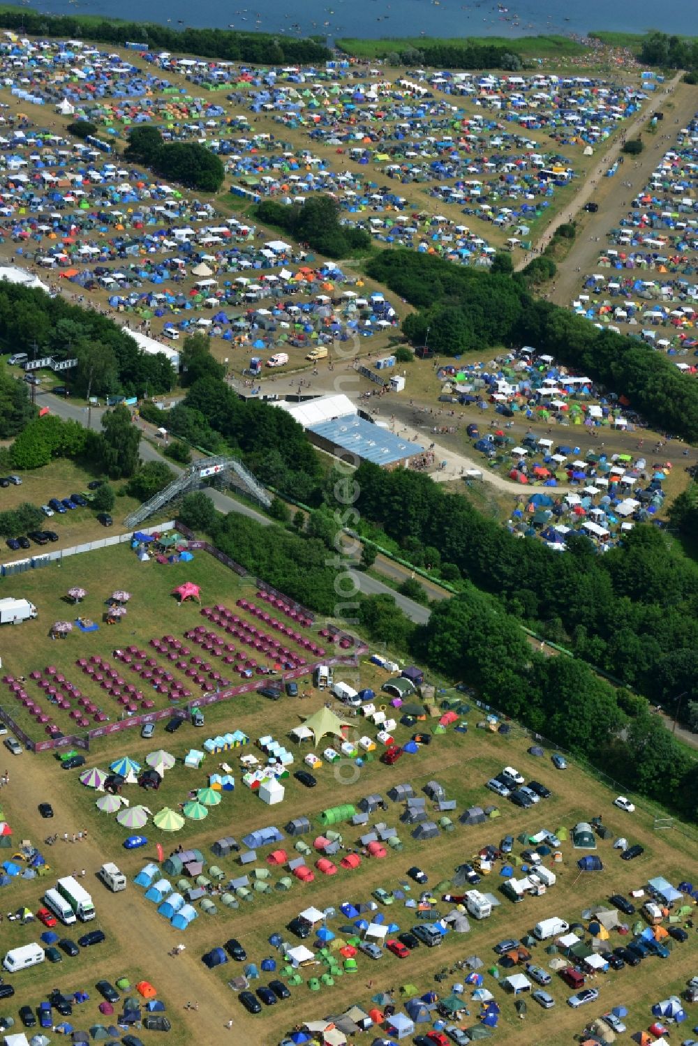 Aerial photograph Gräfenhainichen - View of campground landscape for visitors to the Melt! Festival in Eisenstadt Ferropolis in Graefenhainichen in the state of Saxony-Anhalt. The Melt is a music festival with electronic music and Rock Sound. Since 1999 the festival at Graefenhainichen takes place in the City of Steel Ferropolis