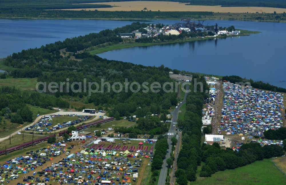 Gräfenhainichen from above - View of campground landscape for visitors to the Melt! Festival in Eisenstadt Ferropolis in Graefenhainichen in the state of Saxony-Anhalt. The Melt is a music festival with electronic music and Rock Sound. Since 1999 the festival at Graefenhainichen takes place in the City of Steel Ferropolis