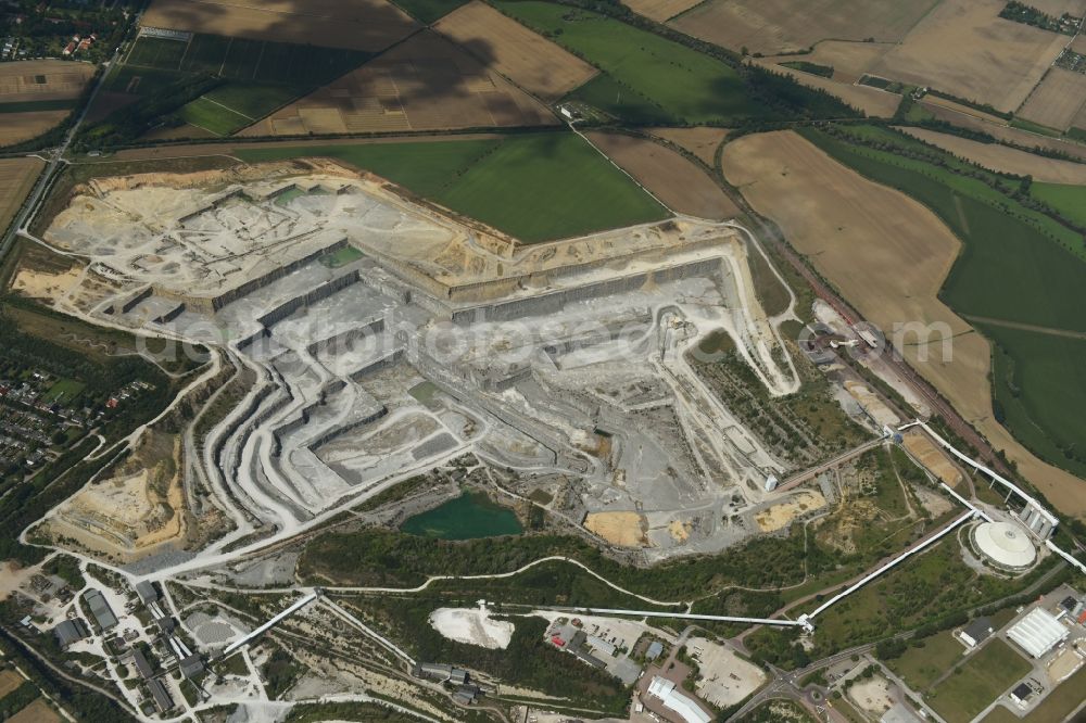 Bernburg (Saale) from above - Site and Terrain of overburden surfaces Cement opencast mining Schwenk in Bernburg (Saale) in the state Saxony-Anhalt, Germany