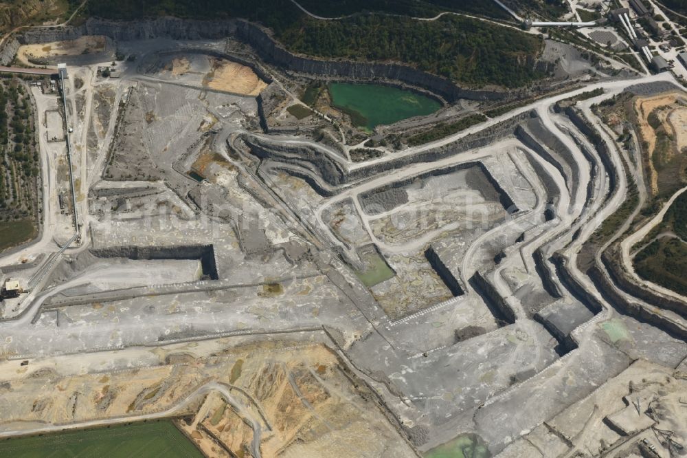 Bernburg (Saale) from above - Site and Terrain of overburden surfaces Cement opencast mining Schwenk in Bernburg (Saale) in the state Saxony-Anhalt, Germany