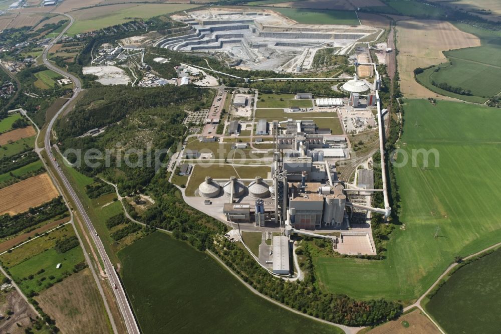 Bernburg (Saale) from above - Site and Terrain of overburden surfaces Cement opencast mining Schwenk in Bernburg (Saale) in the state Saxony-Anhalt, Germany