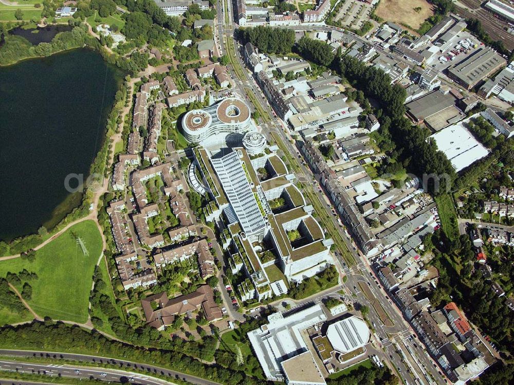 Aerial image Düsseldorf (NRW) - Blick auf die Zentrale der Provinzial Versicherung AG südöstlich vom Düsseldorfer Stadtzentrum im Stadteil Wersten. In unmittelbarer Nachbarschaft zum Bürogebäude befindet sich der Südpark (ehemaliges BUGA-Gelände) mit dem Deichsee und der südl. Autobahnzubringer. Provinzial Rheinland Lebensversicherung AG und Provinzial Rheinland Versicherung AG, Die Versicherung der Sparkassen, Provinzialplatz 1, 40591 Düsseldorf, Telefon: (0211) 978-0, Fax: (0211) 978-1700, E-Mail: service@provinzial.de