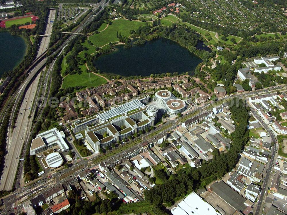 Düsseldorf (NRW) from the bird's eye view: Blick auf die Zentrale der Provinzial Versicherung AG südöstlich vom Düsseldorfer Stadtzentrum im Stadteil Wersten. In unmittelbarer Nachbarschaft zum Bürogebäude befindet sich der Südpark (ehemaliges BUGA-Gelände) mit dem Deichsee und der südl. Autobahnzubringer. Provinzial Rheinland Lebensversicherung AG und Provinzial Rheinland Versicherung AG, Die Versicherung der Sparkassen, Provinzialplatz 1, 40591 Düsseldorf, Telefon: (0211) 978-0, Fax: (0211) 978-1700, E-Mail: service@provinzial.de