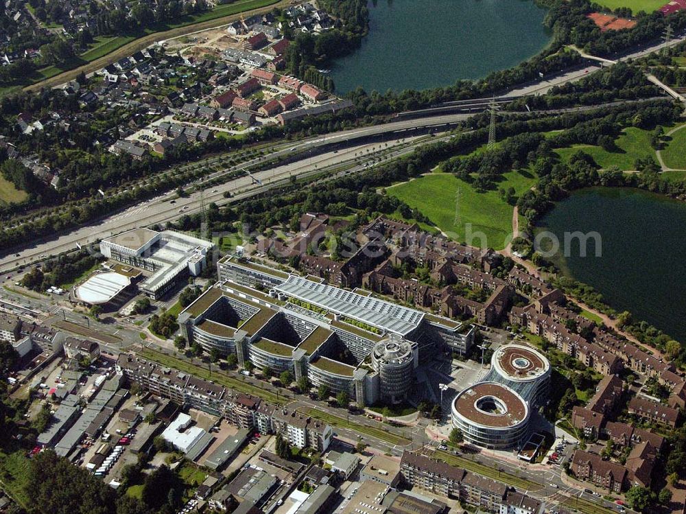 Aerial photograph Düsseldorf (NRW) - Blick auf die Zentrale der Provinzial Versicherung AG südöstlich vom Düsseldorfer Stadtzentrum im Stadteil Wersten. In unmittelbarer Nachbarschaft zum Bürogebäude befindet sich der Südpark (ehemaliges BUGA-Gelände) mit dem Deichsee und der südl. Autobahnzubringer. Provinzial Rheinland Lebensversicherung AG und Provinzial Rheinland Versicherung AG, Die Versicherung der Sparkassen, Provinzialplatz 1, 40591 Düsseldorf, Telefon: (0211) 978-0, Fax: (0211) 978-1700, E-Mail: service@provinzial.de