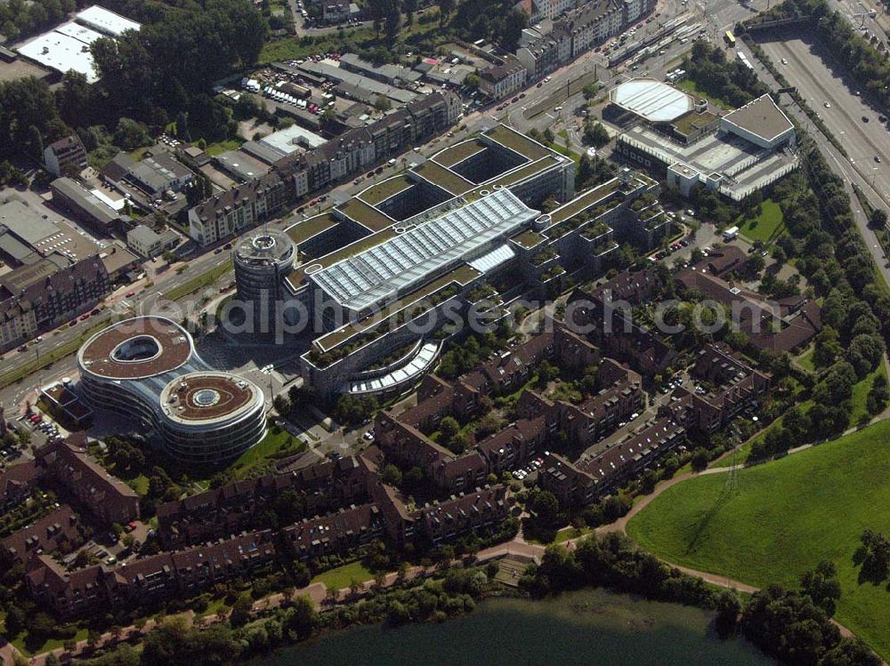 Aerial photograph Düsseldorf (NRW) - Blick auf die Zentrale der Provinzial Versicherung AG südöstlich vom Düsseldorfer Stadtzentrum im Stadteil Wersten. In unmittelbarer Nachbarschaft zum Bürogebäude befindet sich der Südpark (ehemaliges BUGA-Gelände) mit dem Deichsee und der südl. Autobahnzubringer. Provinzial Rheinland Lebensversicherung AG und Provinzial Rheinland Versicherung AG, Die Versicherung der Sparkassen, Provinzialplatz 1, 40591 Düsseldorf, Telefon: (0211) 978-0, Fax: (0211) 978-1700, E-Mail: service@provinzial.de