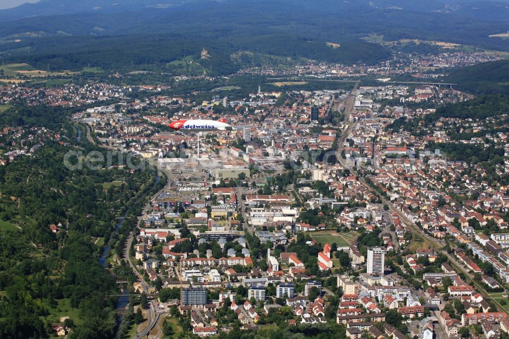 Aerial photograph Lörrach - Zeppelin D - LZZF is flying in the airspace over Loerrach in Baden-Wuerttemberg. The airship is on promotional tour for the Swiss airline Edelweiss, which celebrates its 20th anniversary. The flight with passengers leads over the city center of Basel and the surrounding towns in the border triangle of Switzerland, Germany and France