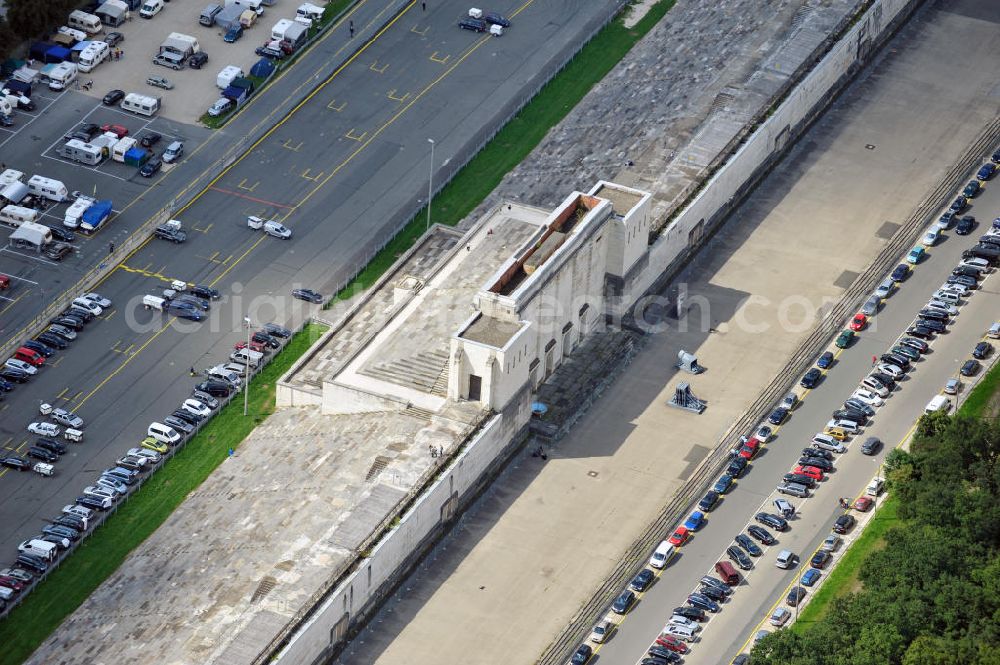 Nürnberg from the bird's eye view: Blick auf Zeppelinhaupttribüne am Zeppelinfeld auf dem ehemaligen Reichsparteitagsgelände in Nürnberg. In den Jahren 1935 bis 1937 wurde die Zeppelinwiese nach einem Entwurf von Albert Speer in ein Aufmarschgelände mit Tribünenanlagen umgestaltet, wobei die auf der nordöstlichen Seite des Feldes errichtete Zeppelinhaupttribüne als dominierende Kulisse entstand. View of the grandstand at the former Nazi party rally grounds in Nuremberg.